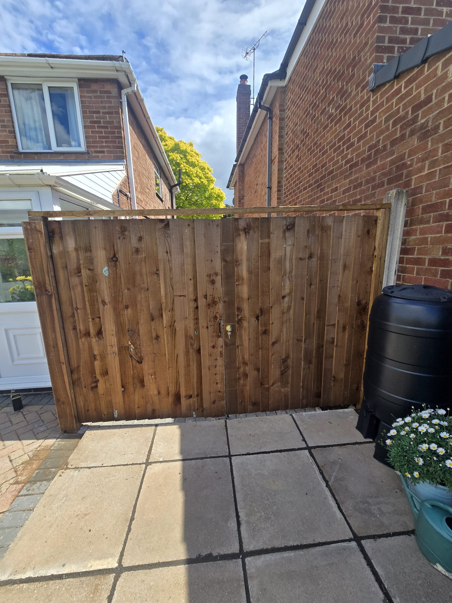 Side gate between brick houses