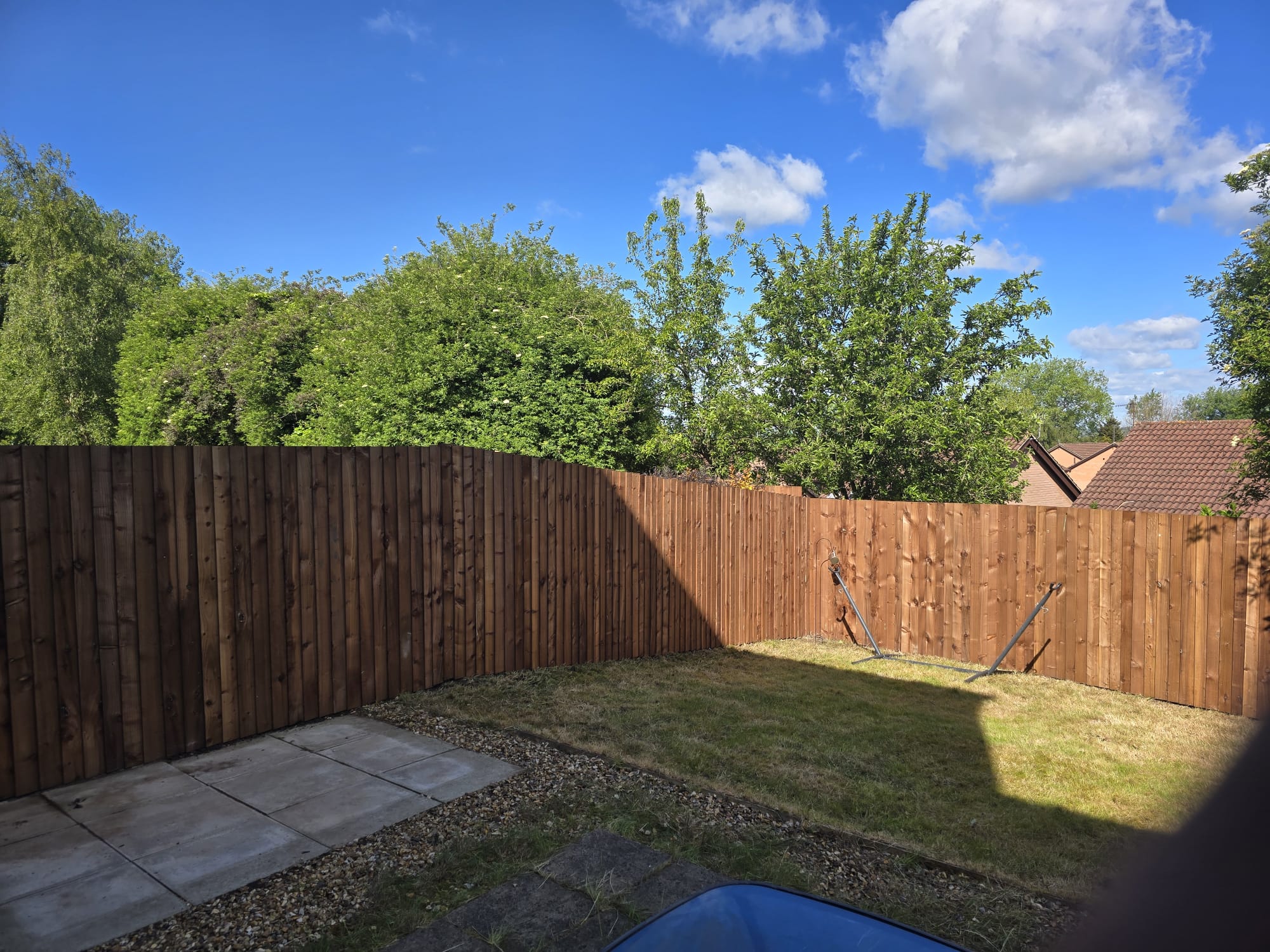 Newly installed timber fencing with landscaped garden